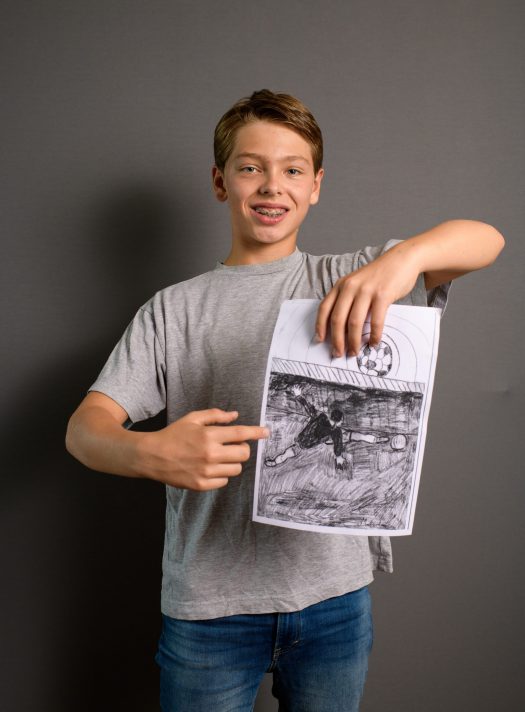 3575139_hch_2469-5f579699d7734 GENEVA, SWITZERLAND - SEPTEMBER 20: Malcom poses for a photo during a UEFA Foundation for children drawing contest for SCUP 2020 photoshoot on September 20, 2019 in Geneva, Switzerland. (Photo by Harold Cunningham - UEFA/UEFA via Getty Images)