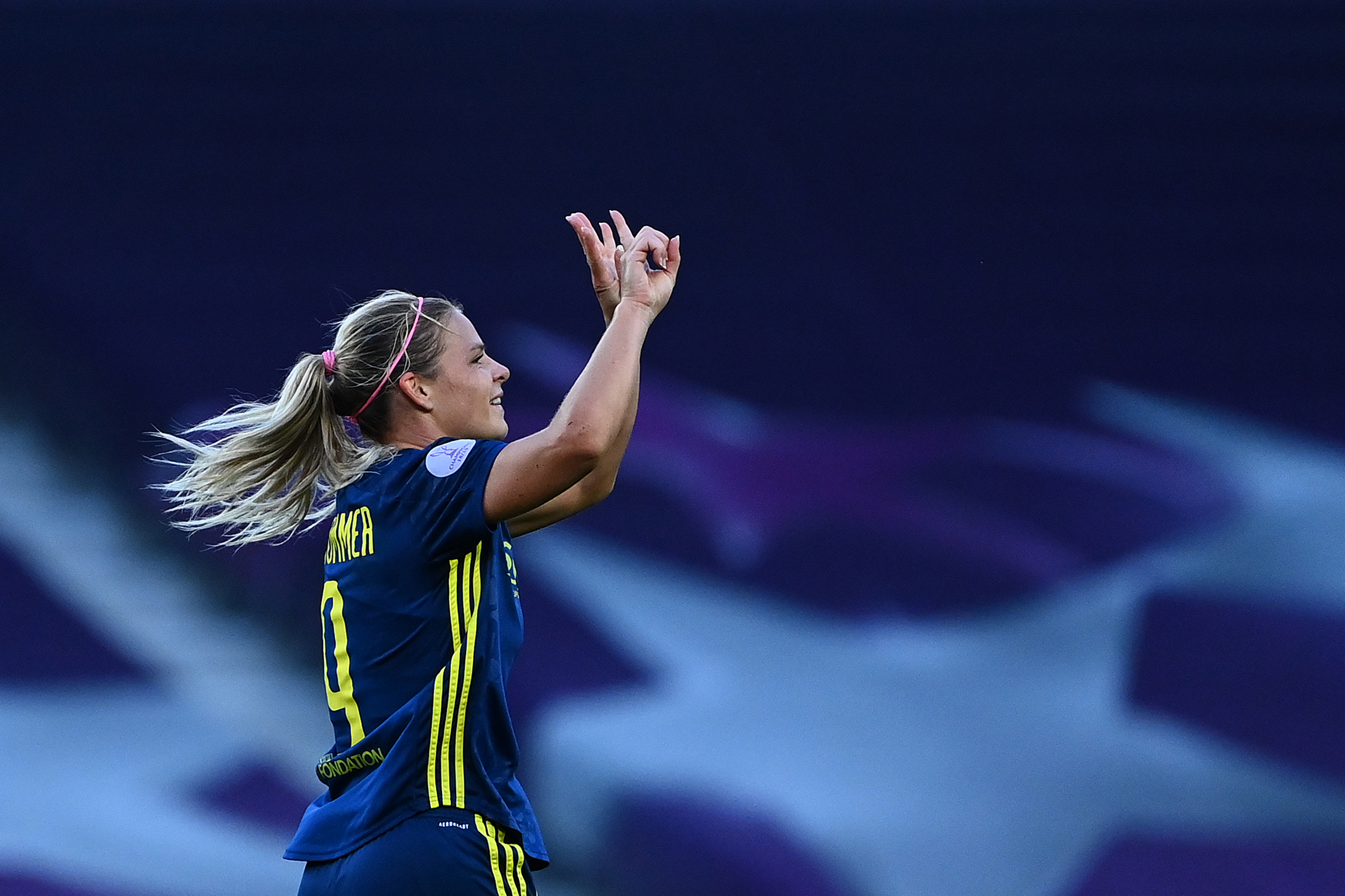 Lyon's French forward Eugenie Le Sommer celebrates after scoring the opening goal during the UEFA Women's Champions League final football match between VfL Wolfsburg and Lyon at the Anoeta stadium in San Sebastian on August 30, 2020. (Photo by GABRIEL BOUYS / POOL / AFP) (Photo by GABRIEL BOUYS/POOL/AFP via Getty Images)