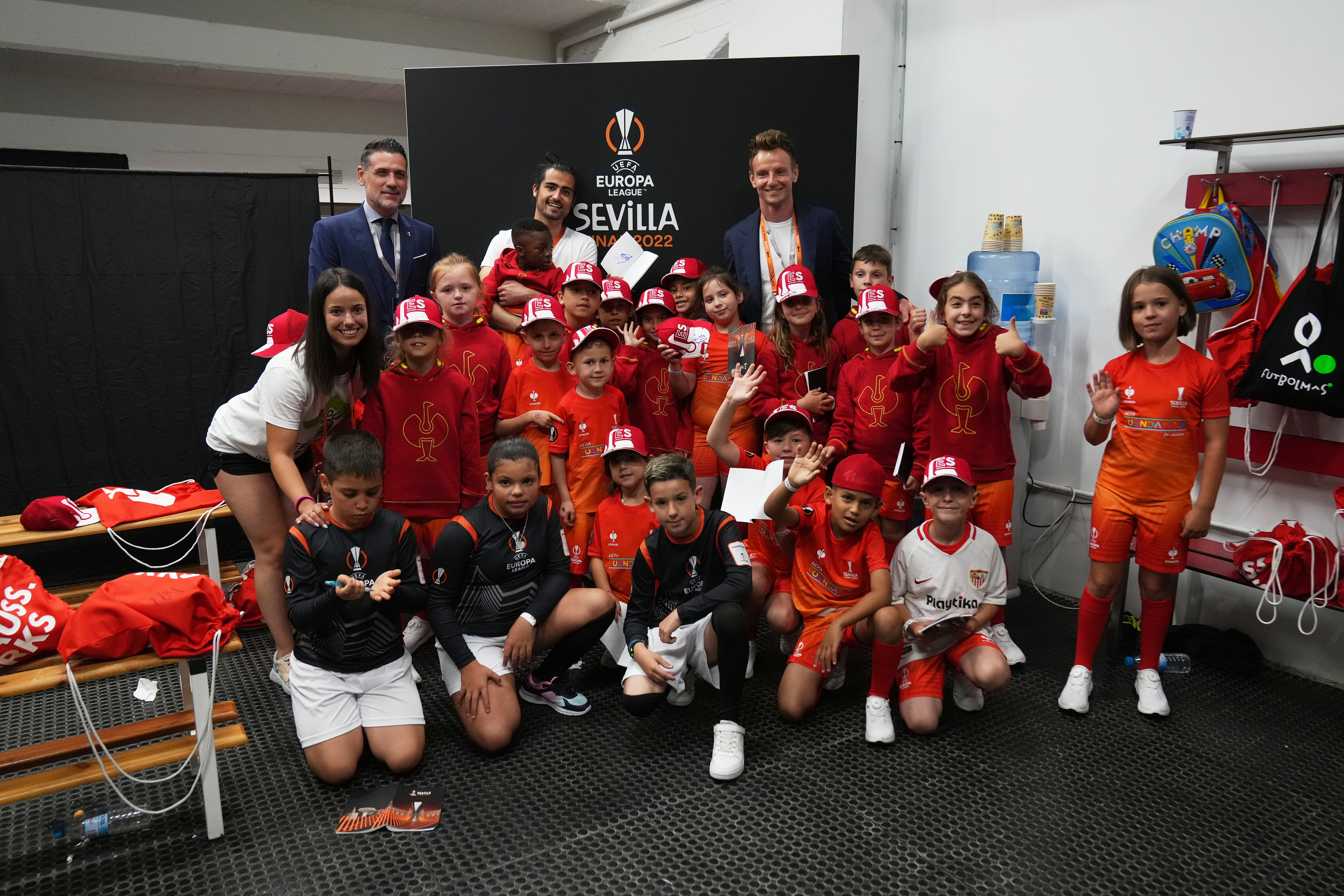 SEVILLE, SPAIN - MAY 18: Youth Programme children Players and referee mascots and OMBC carrier. Ivan Rakitic and Andres Palop. BUEFA Europa League final match between Eintracht Frankfurt and Rangers FC at Estadio Ramon Sanchez Pizjuan on May 18, 2022 in Seville, Spain. (Photo by Angel Martinez - UEFA/UEFA via Getty Images)