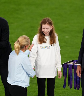 BASEL, SWITZERLAND - JULY 27: Aleksander Ceferin, President of UEFA, shakes hands with a UEFA Foundation For Children kid after the UEFA Women's EURO 2025 Final match between England and Spain at St. Jakob-Park on July 27, 2025 in Basel, Switzerland. (Photo by Alex Caparros - UEFA/UEFA via Getty Images)