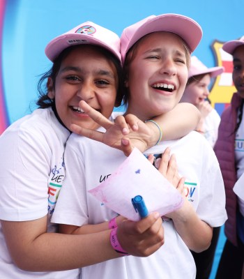OSLO, NORWAY - MAY 22: Young fans pose for a photo during a training session ahead of the UEFA Women's Champions League Final 2026 match between FC Barcelona and Olympique Lyonnais at Ullevaal Stadion on May 22, 2026 in Oslo, Norway. (Photo by Florencia Tan Jun - UEFA/UEFA via Getty Images)